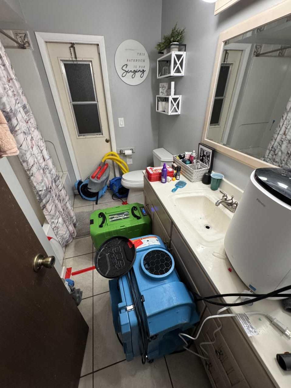 Bathroom during final phase of water damage restoration