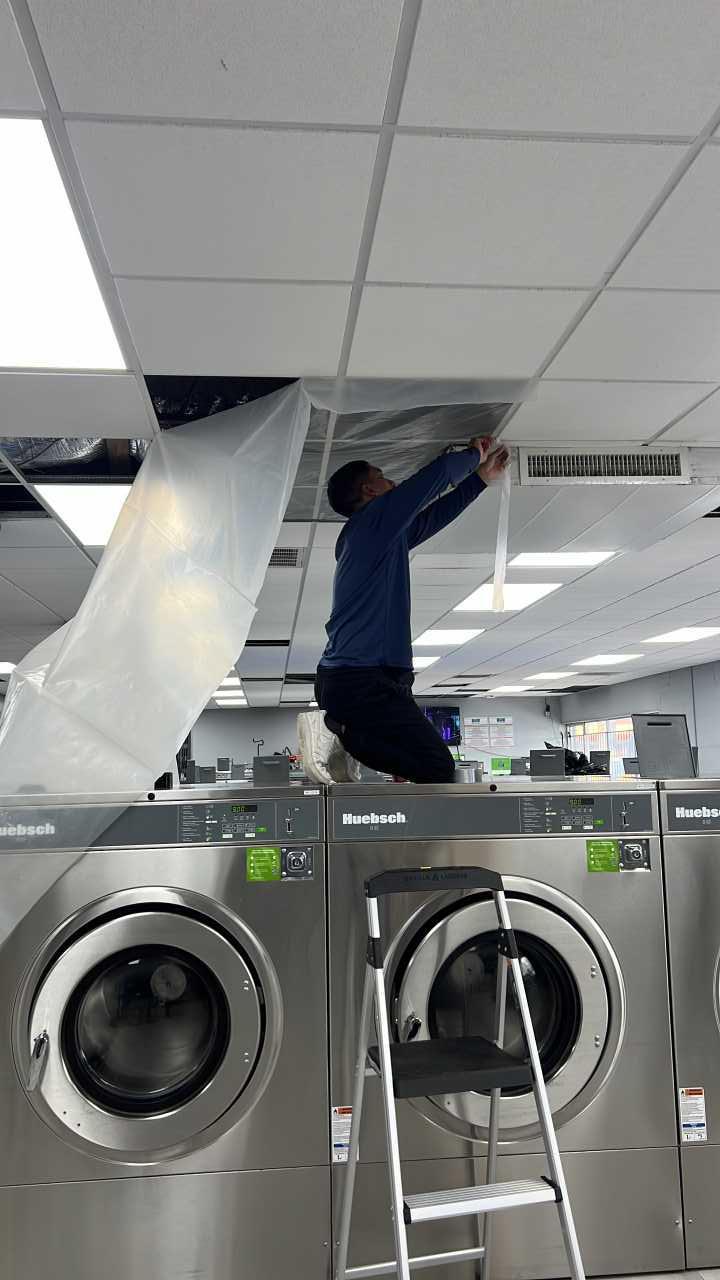 RFS crew setting up containment during commercial water damage restoration