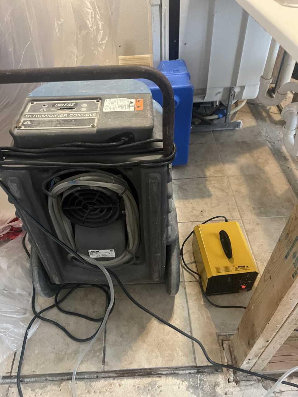 Dehumidifier and drying equipment set up during residential mold remediation